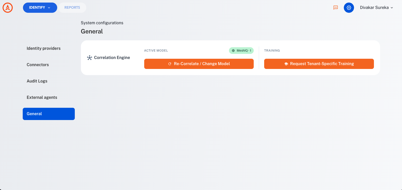 The Correlation Engine card under System configurations, showing an active model of MeshIQ 1, a Re-Correlate / Change Model button, and a Training column with a Request Tenant-Specific Training button