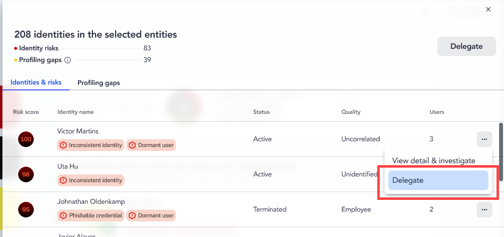 Options menu open on an identity row, with the Delegate action highlighted next to View detail and investigate
